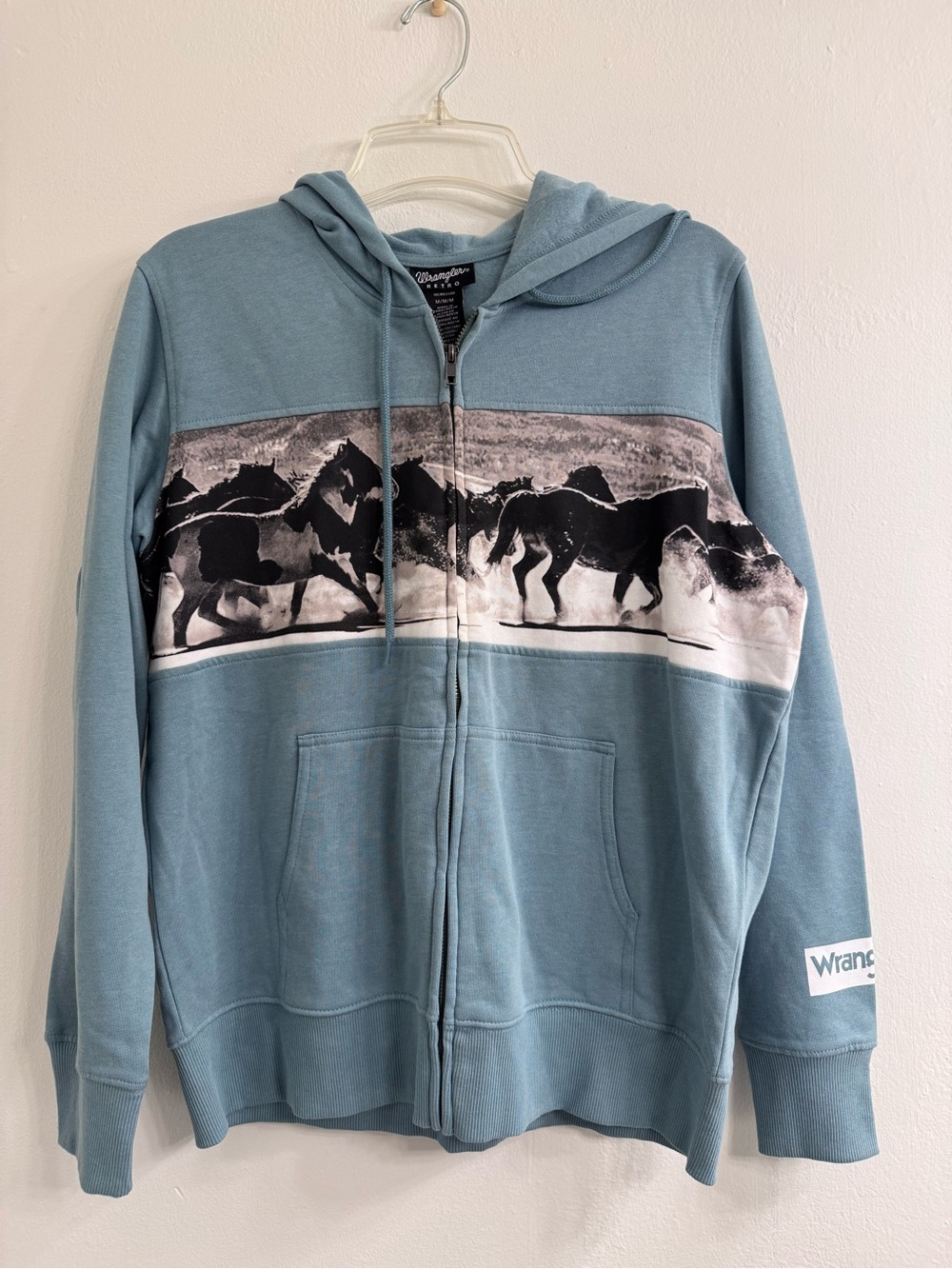 Wrangler Light Blue Zip-Up Hoodie with Black Horse Graphic